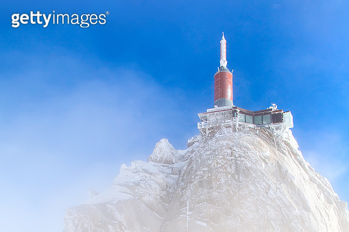 The mountain top station of Aiguille du Midi near Chamonix in fog ...