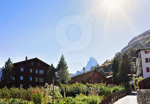 Traditional Swiss Chalets in Zermatt and Matterhorn summit (667845790 ...