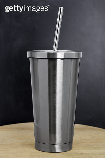 Steel mug on wooden backdrops. Blank stainless tumbler for your design ...
