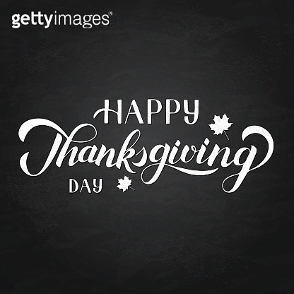 Happy Thanksgiving Day hand written with brush and autumn fall maple ...