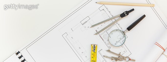 Interior designer table workplace with house plan (1044166382) - 게티이미지뱅크