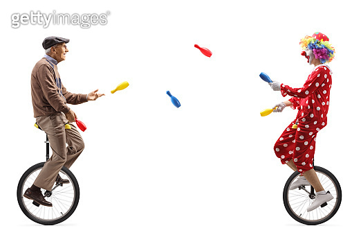 Elderly man and a clown riding unicycles and juggling (1291260441) - 게티 ...