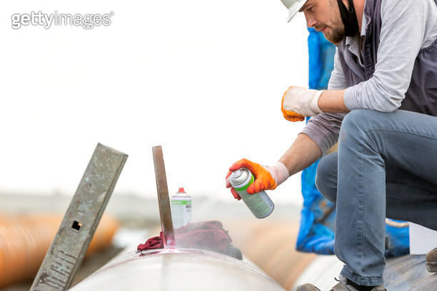 The non-destructive testing technician is inspection to welds of ...