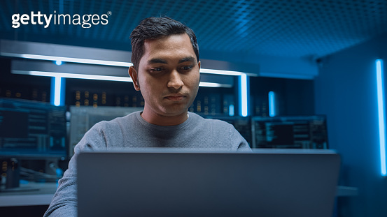 Portrait of Software Programmer Sitting at His Desk and Working on ...