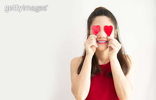 Asian beautiful woman with red theme are holding red heart shape paper ...