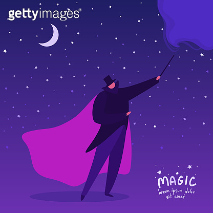 A magician casts a spell with his magic wand. An illusionist doing ...