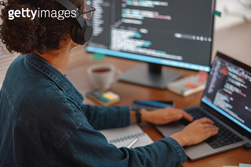 Female freelancer making new project as web designer and programmer on ...
