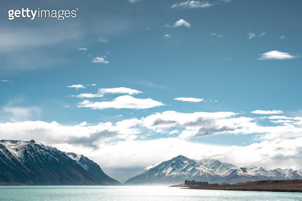 Scenic view of Lake Tekapo east bank. Beautiful view driving along the ...