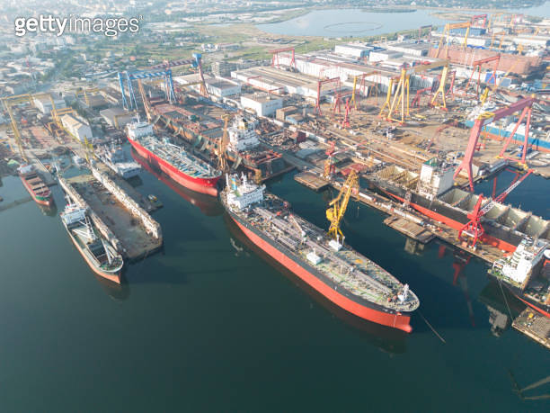 Aerial view of shipyard dry dock maintenance and repair cargo ship ...