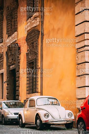 Old Retro Vintage White Color Volkswagen Beetle Car Parked At Street ...