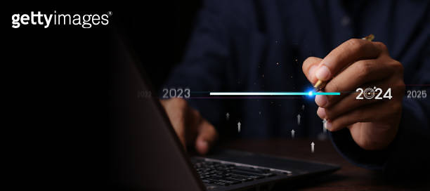 Countdown to 2024 concept. the taps a virtual download bar with a ...