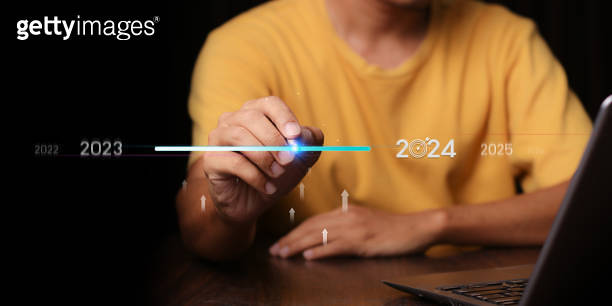 Countdown to 2024 concept. the taps a virtual download bar with a ...