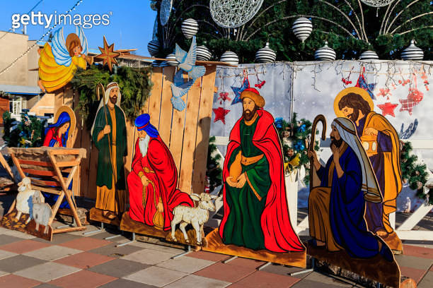 Wooden Christmas Nativity scene with Holy family in city park ...