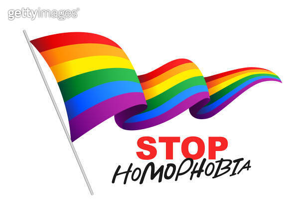 Rainbow striped LGBT flag on the flagpole flutters in the wind. Stop ...