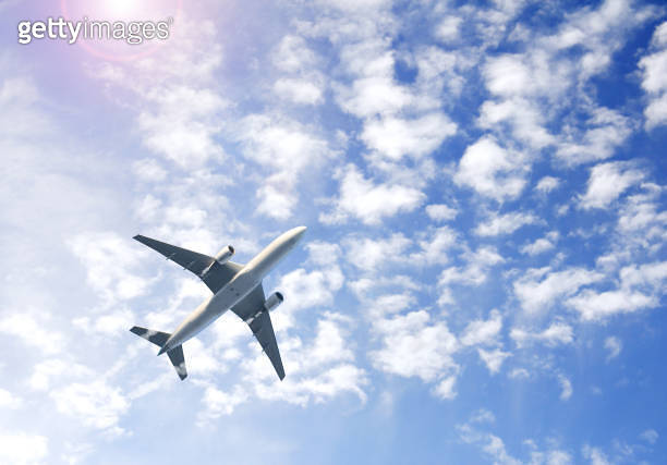 Horizontal nature background with aircraft and Jet trailing smoke in ...