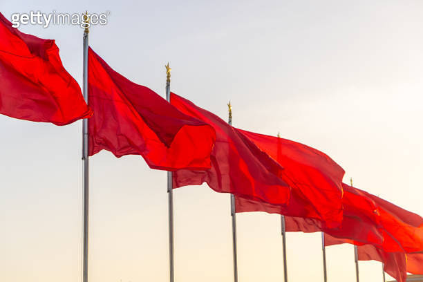 A row of red flags blowing in the wind in Beijing,China (2156179273 ...