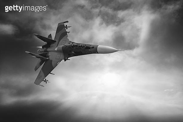Black and White photo of Air Force Fighter Jets flying over clouds ...