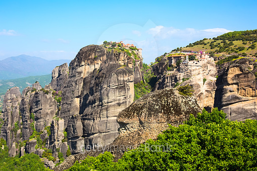 Varlaam and Great Meteoro Monasteries on the cliff at Meteora rocks ...