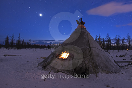 Chum of nomadic tribe at the polar night, clear sky with frosty weather ...