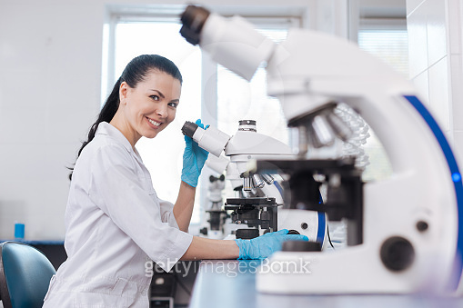 Positive Researcher Positive delighted researcher looking at camera 이미지 (687874708) - 게티이미지뱅크