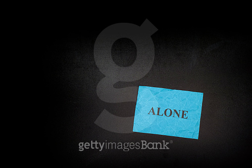 Blue crumpled paper with word Alone 이미지 (636789524) - 게티이미지뱅크