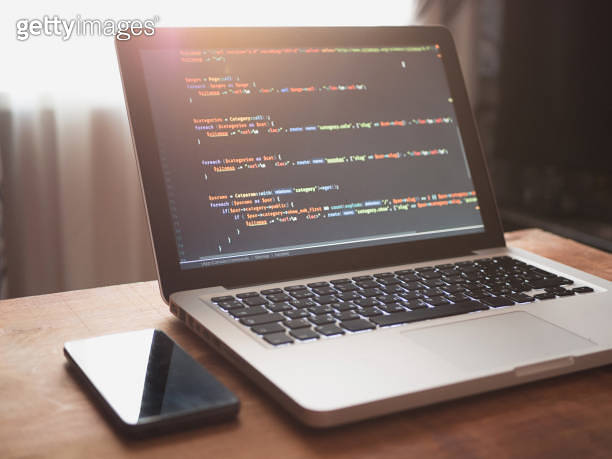 Computer code on laptop (web developing) and cellphone 이미지 (991989098 ...