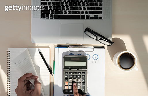 Close up businessman using calculator on documents Unrecognizable ...