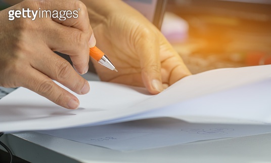 Hand Working Paper Businessman hands working in Stacks of paper files for searching ...