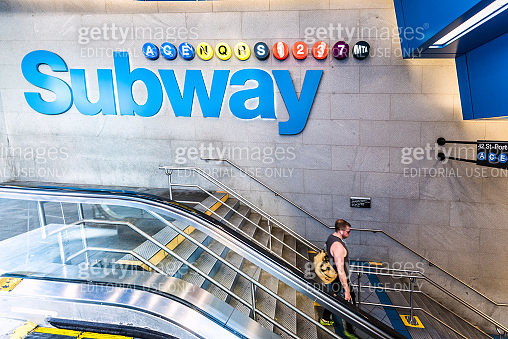 Underground transit by sign in NYC Subway Station, sign for Port ...