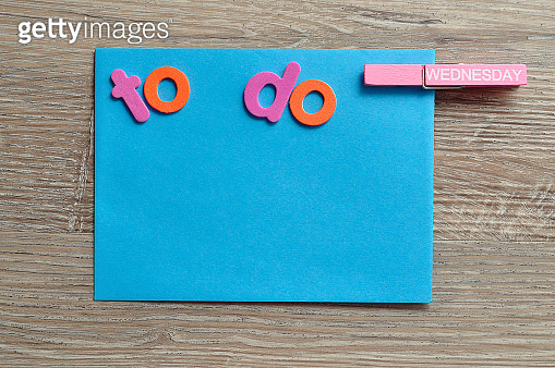 Wednesday Taking Notes A blue note with the words to do and a peg with the word Wednesday ...