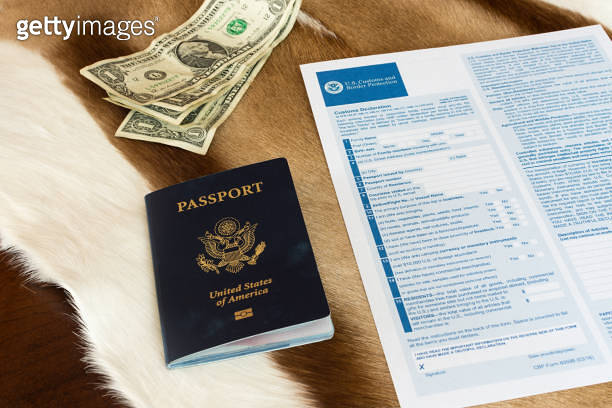 US Customs Declaration Form and US Passport on Springbok hide rug 이미지 ...