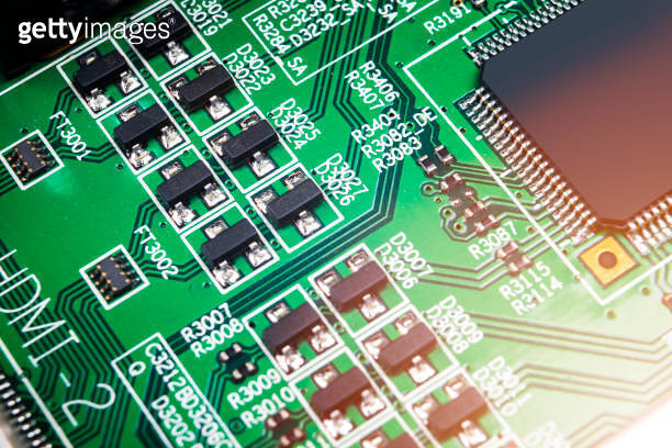Resistor Computing Macro shot of a Circuitboard with resistors microchips and electronic ...