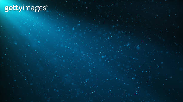 Abstract particles background of shining, sparkling blue particles ...
