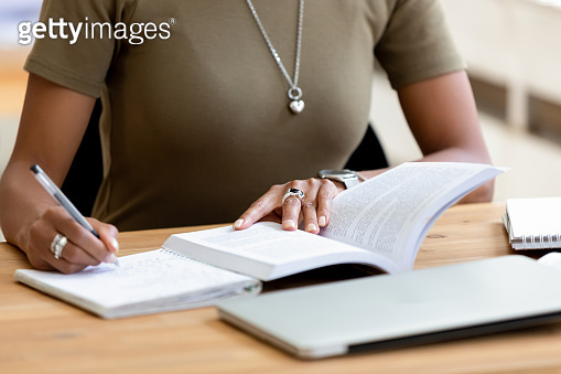Close up african female hands holding pen make notes 이미지 (1146488509 ...