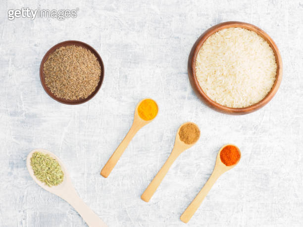 Spices set and rice on concrete background. Modern apothecary ...