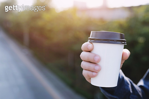 people person business man drinking paper cup coffee of hot in hand ...