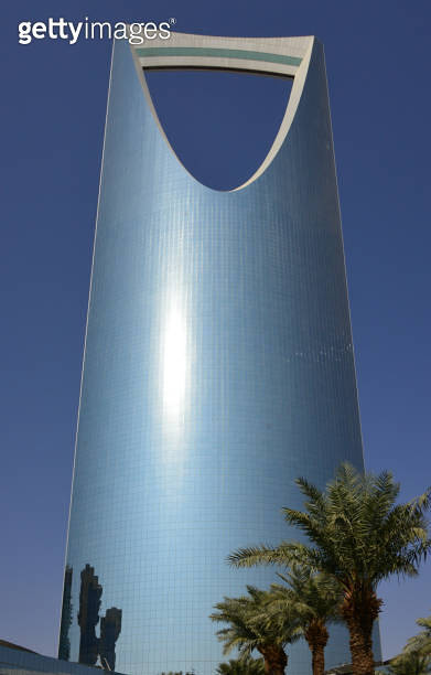 Tree Tower Riyadh Kingdom Centre tower and palm trees, view from Street 94, Riyadh, Saudi ...