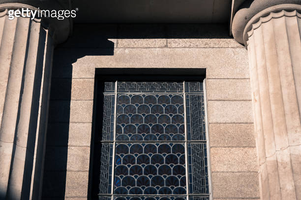 Window Over Column Stained glass windows and architectural columns of a neoclassical ...
