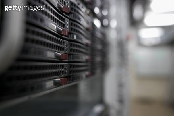 Computer Server mount on rack in data center room with red lighting ...