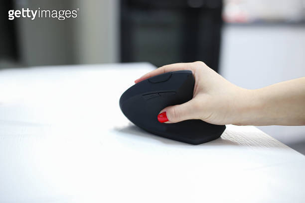 girl's hand uses a vertical ergonomic computer mouse joystick. 이미지 ...