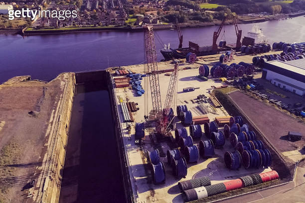 A warehouse of cable bays in cargo port. Cargo port and equipmen ...