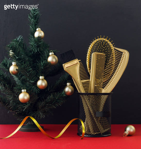 Christmas card with gold hair salon accessories and Christmas tree
