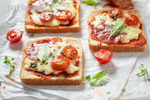 Rustic Toaste Rustic Toast with salami, cheese and tomato 이미지 (1282218840) - 게티이미지뱅크