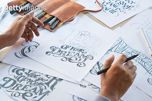 Typography Calligraphy artist designer drawing sketch writes letting ...