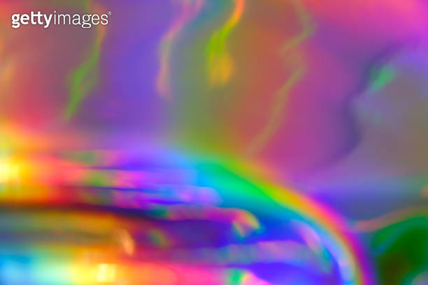 abstract holographic iridescent foil texture background with rainbow ...