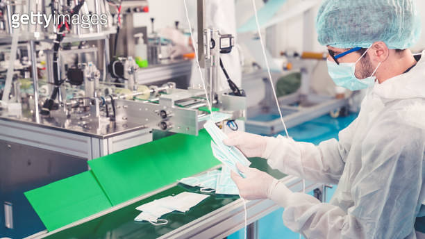 Face mask production line in modern factory 이미지 (1276667150) - 게티이미지뱅크