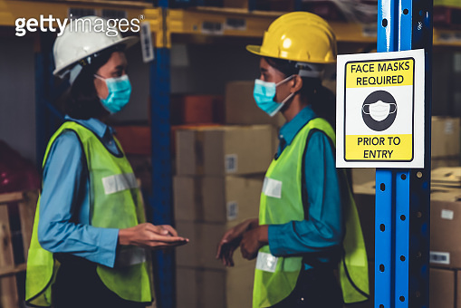 Caution sign in factory warning to industry labor worker to prevent ...