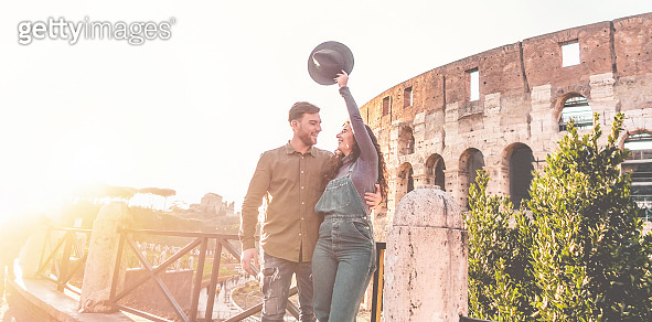 People Having Fun In Rome Young couple having fun in Rome with Colosseum as background - Lovers ...