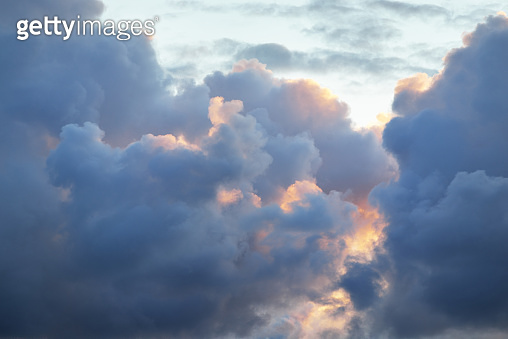 Epic sunset sky with colorful glowing clouds after thunderstorm. Golden ...