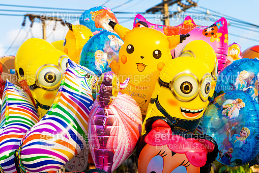 Funny colored balloons in the form of cartoon characters. Joy for the ...